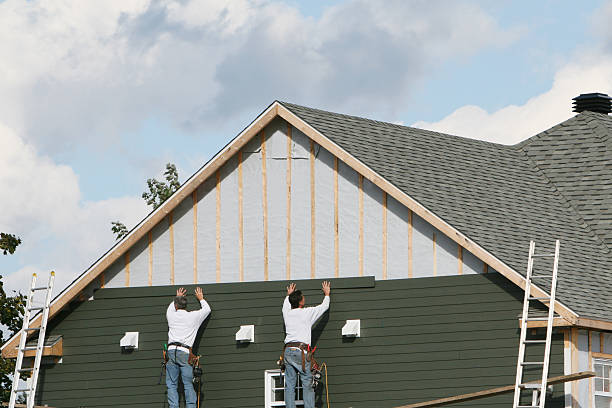 Professional Siding Contractor technician working in Freehold, NJ